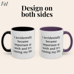 May include: Two white ceramic mugs with black and purple interiors and handles. The mugs have the text "I accidentally became important at work and it's ruining my life." The words "Design on both sides" are above the mugs.