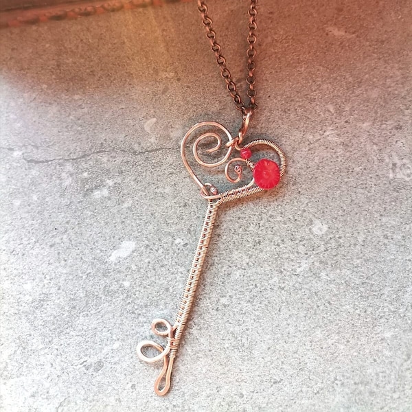 Copper wire pendant, heart necklace with red coral flower carved