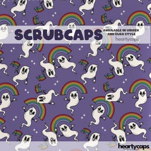 May include: A purple scrub cap with a repeating pattern of white cartoon ghosts holding rainbow flags and rainbows. The text "SCRUBCAPS" is displayed across the top. The scrub cap is available in unisex and Euro style.