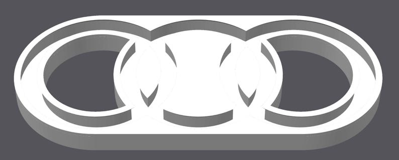 May include: A 3D-rendered white abstract design on a gray background. The design features three interconnected oval shapes, each with a curved, open center. The shapes are outlined with a thick, white border, creating a sense of depth and dimension.