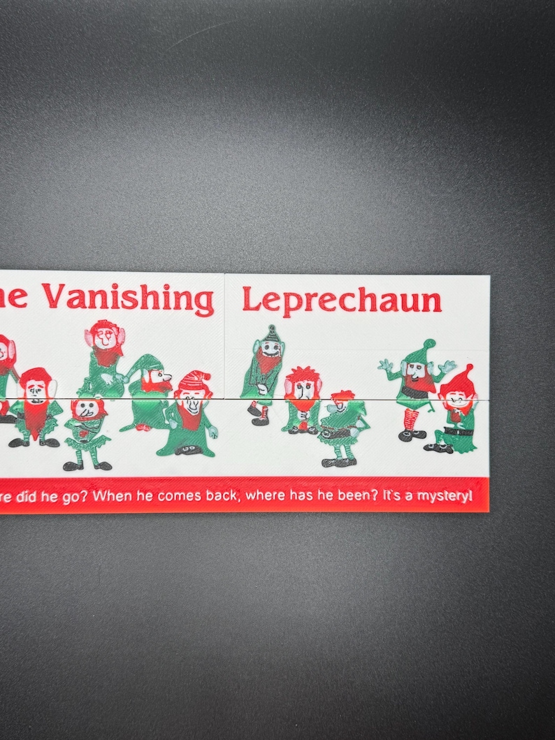 May include: A white card with the text "The Vanishing Leprechaun" and a picture of nine green leprechauns with red hats. The text "Where did he go? When he comes back, where has he been? It's a mystery!" is at the bottom of the card.