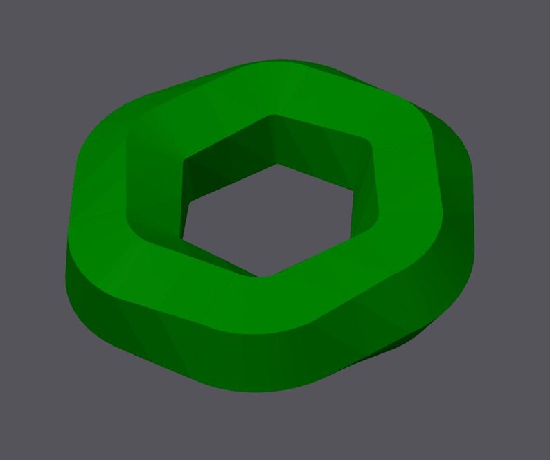 May include: A green, three-dimensional, hexagonal shape with a hole in the center.