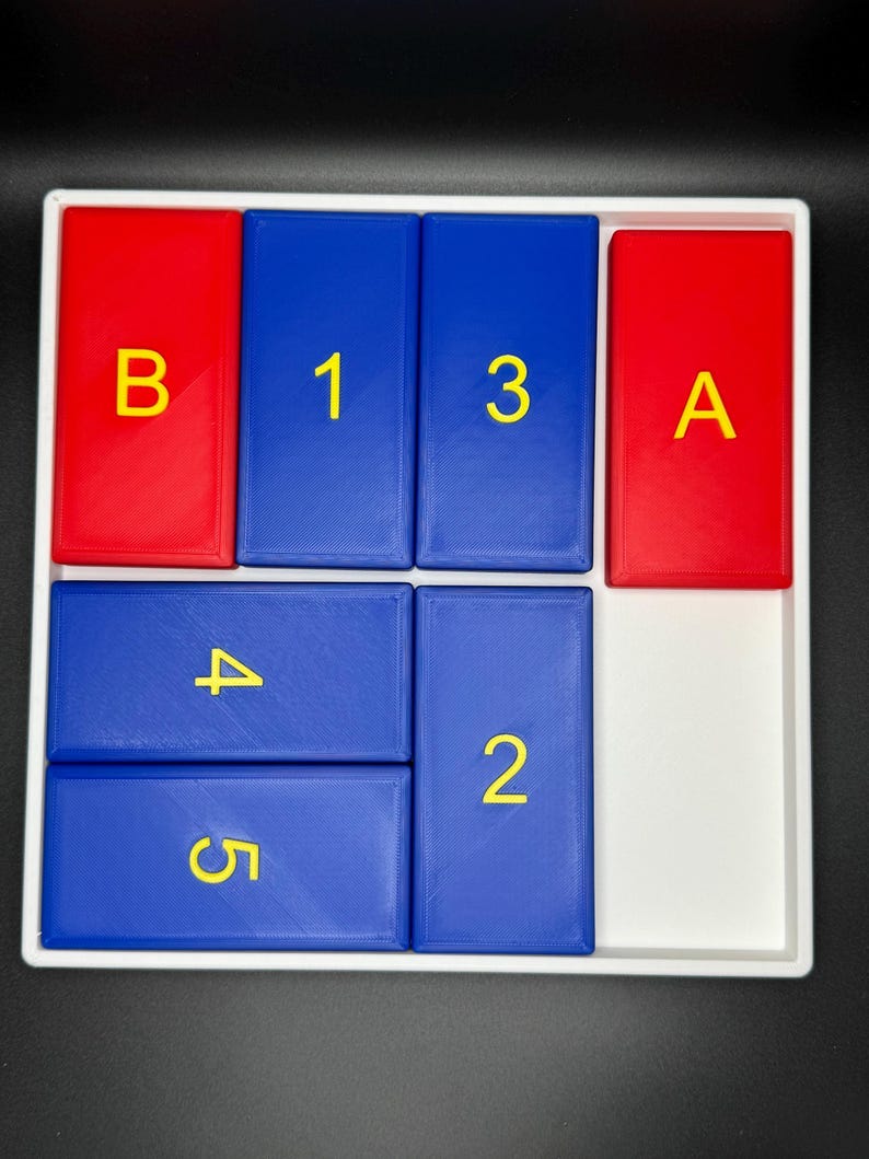 May include: A white tray with blue and red tiles. The tiles have yellow letters and numbers on them. The letters are "A" and "B". The numbers are "1", "2", "3", "4", and "5".