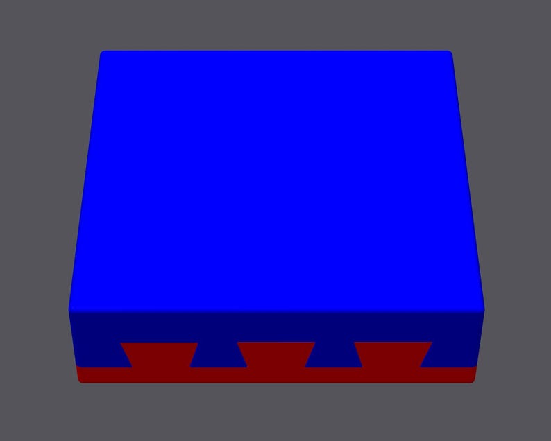 May include: A blue rectangular platform with a red base. The base has a repeating pattern of five triangular shapes.