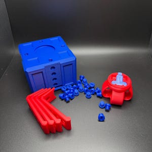 May include: A set of 3D printed parts in red and blue. The set includes a blue box with holes, a red connector with a blue screw, four red brackets, and a pile of blue plastic screws.