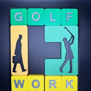May include: A green and yellow tile puzzle with the word "GOLF" on top and the word "WORK" on the bottom. The puzzle features a silhouette of a person playing golf and a silhouette of a person carrying a briefcase.