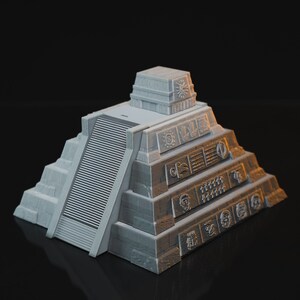 May include: A gray 3D printed model of a Mayan pyramid with intricate carvings and a small temple on top.