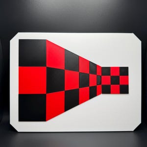 May include: Geometric abstract art piece featuring a white rectangular frame with a black and red checkered pattern. The pattern appears to recede into the distance, creating a 3D effect. The artwork is a bold statement.
