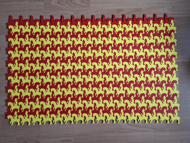 May include: An interlocking puzzle mat featuring a repeating pattern of red and yellow horse silhouettes. The foam mat has a scalloped edge. The design creates a visually engaging surface, suitable for play or decoration.