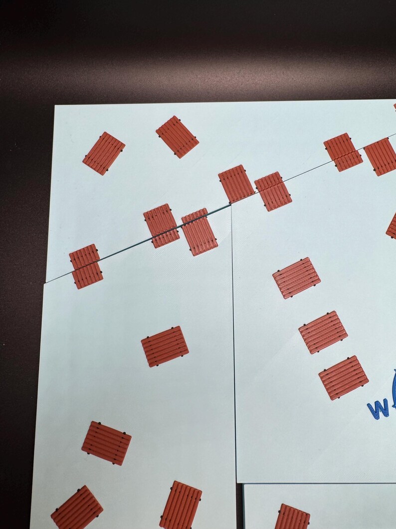 May include: A light blue and white puzzle with a pattern of small, reddish-brown wooden planks. The planks are scattered across the puzzle pieces, connected by a thin black line. The puzzle is partially assembled.