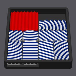 May include: A black tray with a red, white and blue patterned design. The tray is divided into nine sections, each with a different pattern. The top section is red, and the remaining sections are blue and white.