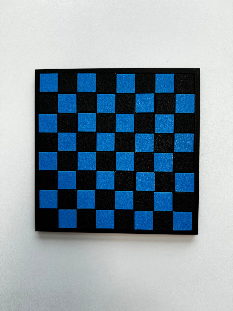 May include: A black and blue checkerboard game board.
