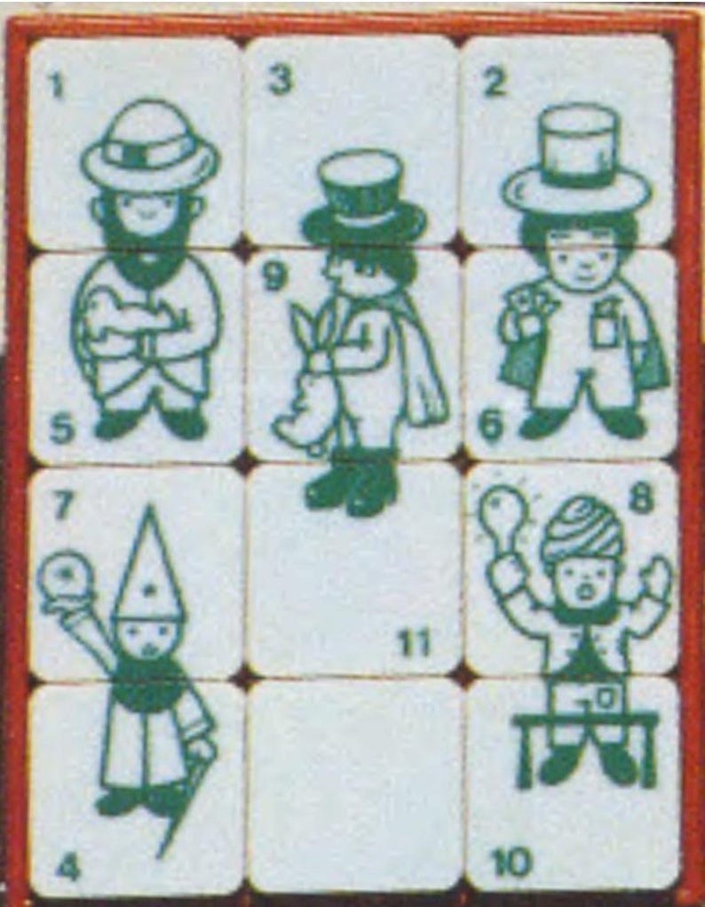 May include: A green and white puzzle with 11 numbered squares. Each square features a cartoon illustration of a person wearing a hat. The hats include a top hat, a pointed hat, a bowler hat, and a turban.