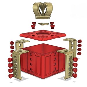 May include: A disassembled 3D printed chess king piece. The king is made of red and gold plastic. The king is made up of a base, four side pieces, a top piece, and a crown. The crown is separate from the top piece.