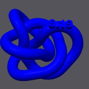May include: A blue, three-dimensional knot with the number "849" printed on it.