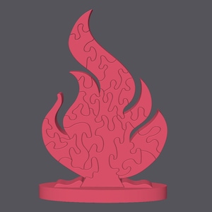 Puede incluir: Un rompecabezas s&oacute;lido con forma de llama de color rosa sobre una base circular. El objeto est&aacute; compuesto por m&uacute;ltiples piezas entrelazadas con bordes curvos e irregulares que se unen para formar la silueta de un fuego con tres puntas.