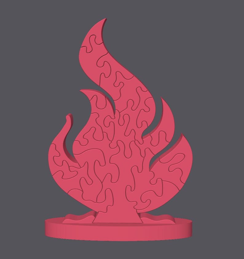 Puede incluir: Un rompecabezas s&oacute;lido con forma de llama de color rosa sobre una base circular. El objeto est&aacute; compuesto por m&uacute;ltiples piezas entrelazadas con bordes curvos e irregulares que se unen para formar la silueta de un fuego con tres puntas.