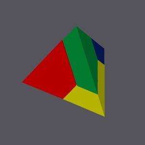 Op de afbeelding: Een 3D geometrische vorm, een driehoekig prisma, met rode, groene, gele en blauwe secties. De vorm is geplaatst tegen een grijze achtergrond.
