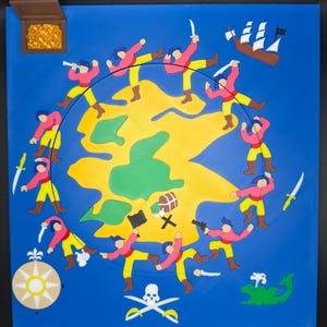 May include: A colorful pirate-themed artwork on a blue background. It features a yellow island surrounded by figures in pink shirts and yellow pants, a treasure chest, a ship, and pirate symbols.