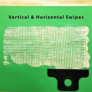 May include: A white paint or paste is spread on a green surface using a black comb-like tool. The paint is spread in a grid pattern with vertical and horizontal lines. The text "Vertical & Horizontal Swipes" is at the top of the image.