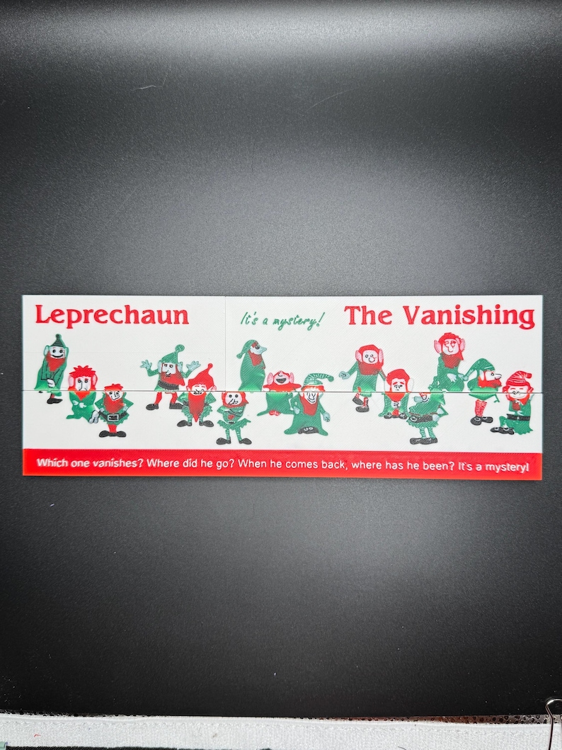 May include: A vintage game card featuring a group of green leprechauns with red hats. The card has the text "Leprechaun" and "The Vanishing" with the question "Which one vanishes? Where did he go? When he comes back, where has he been? It's a mystery!"