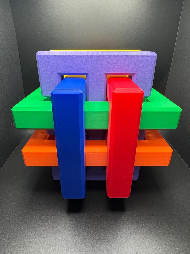May include: A colorful wooden puzzle with interlocking pieces. The puzzle is made of five pieces, each a different color: purple, green, orange, blue, and red.