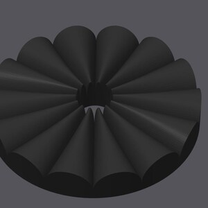 May include: A black, circular object with a series of cone-shaped elements arranged around a central opening. The object has a matte finish and is set against a gray background. The design is symmetrical and geometric.