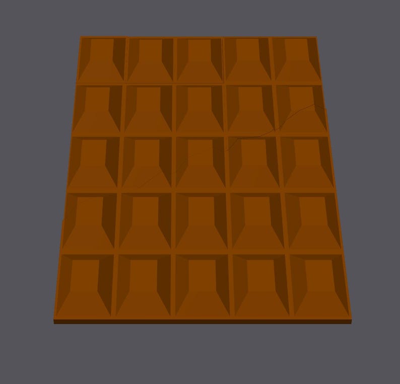 Op de afbeelding: Een bruine chocolade reep met een getextureerd oppervlak. De reep is verdeeld in 36 vierkanten.