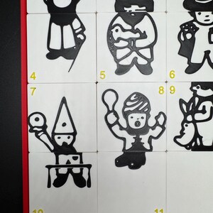 May include: A set of 11 black and white illustrations of people with different hats and accessories. The illustrations are on white squares with yellow numbers 4 through 11.
