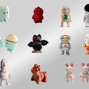 Puede incluir: Una colecci&oacute;n de 12 peque&ntilde;as figuritas pintadas a mano. Las figuritas est&aacute;n hechas de varios materiales, incluyendo cer&aacute;mica, pl&aacute;stico y madera. Representan una variedad de personajes, incluyendo un cupcake, un murci&eacute;lago, un reno, un esqueleto y un astronauta.