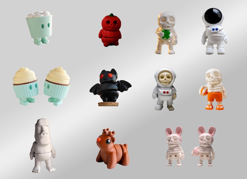 Puede incluir: Una colecci&oacute;n de 12 peque&ntilde;as figuritas pintadas a mano. Las figuritas est&aacute;n hechas de varios materiales, incluyendo cer&aacute;mica, pl&aacute;stico y madera. Representan una variedad de personajes, incluyendo un cupcake, un murci&eacute;lago, un reno, un esqueleto y un astronauta.