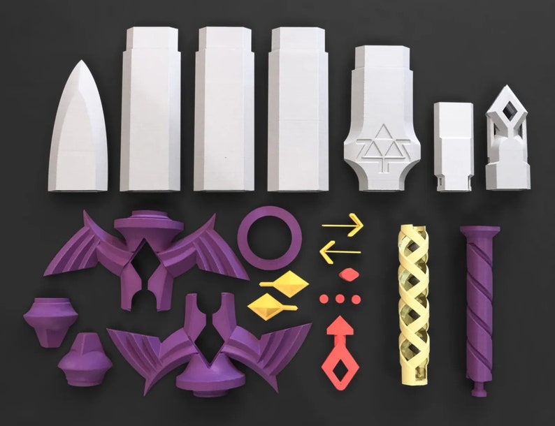 May include: A set of 3D printed plastic pieces in various shapes and colors, including purple, yellow, and white. The pieces are designed to be assembled into a larger object, possibly a model or toy.
