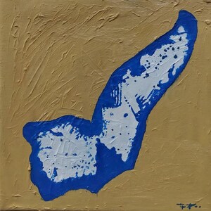 May include: Abstract painting on canvas. A blue and white shape with paint splatters is set against a textured tan background. The artwork has a modern aesthetic, with visible brushstrokes and a square format.