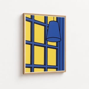 May include: A framed wall art print featuring a graphic illustration of a blue window frame with a yellow background and a blue pendant lamp hanging in the upper right corner. The artwork is enclosed in a light-colored wooden frame.