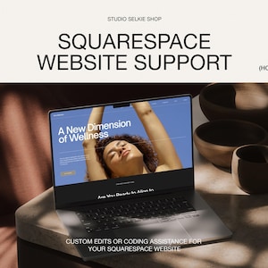 May include: A white ceramic mug with a black handle and the text "But First, Coffee" in a black, handwritten-style font. The mug is on a white surface.