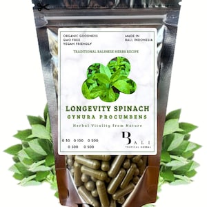 May include: A silver pouch of Longevity Spinach capsules, a herbal supplement. The label reads "Longevity Spinach Gynura Procumbens Herbal Vitality from Nature." The packaging also states "Organic Goodness, GMO Free, Vegan Friendly, Made in Bali, Indonesia."
