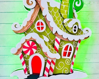 Glowing Grinch Gingerbread house