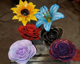 Custom made metal flowers and forever roses.
