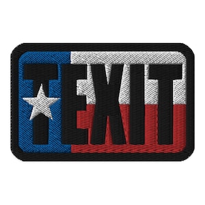 May include: A black and white embroidered patch with the word "EXIT" in large black letters. The letters are superimposed over a stylized Texas flag with a blue, white, and red color scheme.