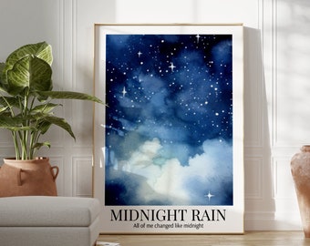 May include: A watercolor painting of a starry night sky with clouds. The painting is framed and hanging on a white wall. The text "MIDNIGHT RAIN" and "All of me changed like midnight" is printed below the painting.