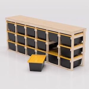 May include: A wooden storage shelf with 15 black plastic storage bins with yellow lids. The shelf has three tiers and is made of natural wood.