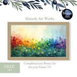 May include: A watercolor painting of a field of four-leaf clovers in a rainbow pattern. The clovers are arranged in a gradient from red to purple, with green leaves. The painting is framed in a light brown frame. The text "Mainly Art Works" is at the top of the image.