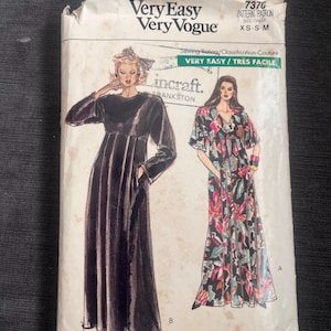 May include: A vintage Very Easy Very Vogue sewing pattern. The pattern shows illustrations of two long dresses. The pattern size is XS-S-M. The pattern is labelled "Very Easy" and includes the Lincraft and Frankston brands.
