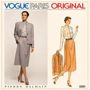May include: A Vogue Paris Original sewing pattern featuring a Pierre Balmain design. The image shows a woman wearing a light gray skirt suit and a drawing of a woman in a long skirt and blouse. The text "VOGUE PARIS ORIGINAL" is at the top.