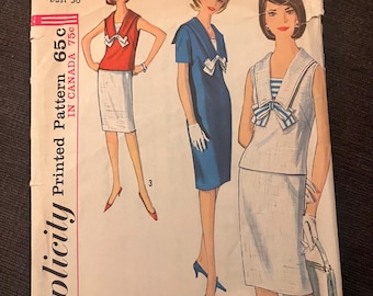 May include: Vintage Simplicity pattern 5840, featuring illustrations of three women in 1960s-style dresses. The pattern includes a red top and white skirt, a blue dress, and a white and blue striped dress and skirt. The bust size is 36 inches.