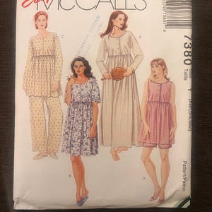 May include: McCall's sewing pattern featuring four sleepwear designs. The pattern includes a pajama set, a floral print dress, a long nightgown, and a pink dress. The pattern size is Y (Xsm, Sml, Med).