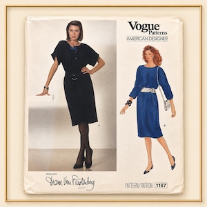 May include: Vogue Patterns American Designer sewing pattern featuring two dress designs. One dress is black with short sleeves and a belt, the other is blue with long sleeves and a belt. The pattern is designed by Diane Von Furstenberg. Pattern number 1187.