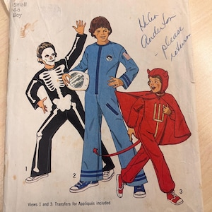 May include: Vintage Simplicity sewing pattern 6696 for children's Halloween costumes. The pattern includes instructions for a skeleton, astronaut, and devil costume. The cover shows illustrations of the costumes and includes the text "Small 4-6 Boy".