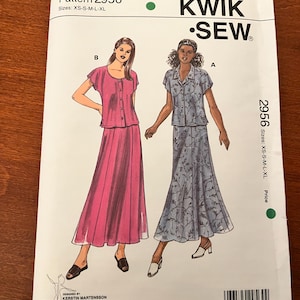 May include: Kwik Sew pattern 2956, showing illustrations of two women's outfits: a pink top and skirt, and a floral print top and skirt. The pattern includes sizes XS-XL. Designed by Kerstin Martensson.
