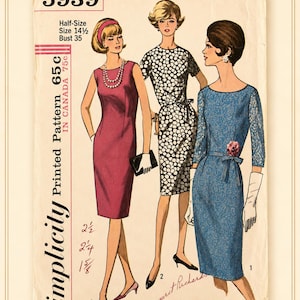 May include: A vintage Simplicity sewing pattern envelope 5939 for a half-size 14 1/2 dress with a 35 inch bust. The illustration features three figures wearing different dress styles, including a solid pink sheath, a black and white patterned dress, and a blue lace dress with a floral accent.
